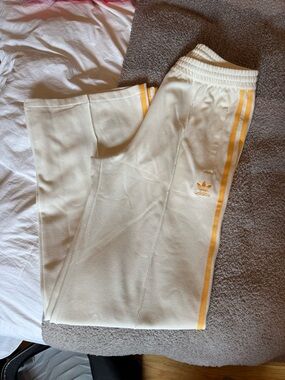 Adidas Cream Track Pants with Yellow Stripes
